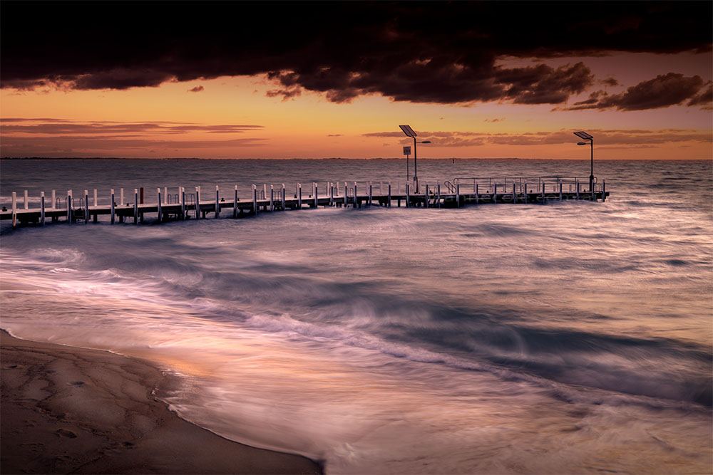 safety-beach-pier-stormy-sunset-1